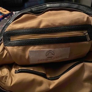 Black handbag with crossover strap